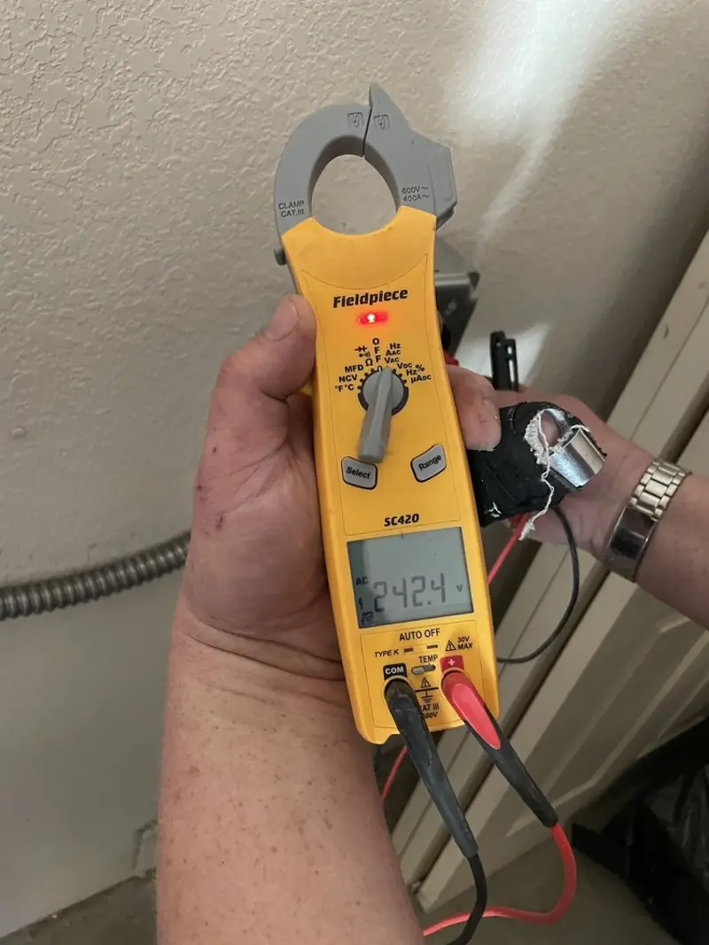 Voltage testing with clamp meter during Ceiling Fan Installation in Twentynine Palms